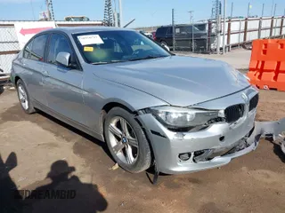 2014 BMW 3 Series 320i with VIN WBA3B1G58ENS81101, listed as a IAAI auction lot 38950717 with 1 mi miles. Bid and sale history available at carsss.com. Image 1.
