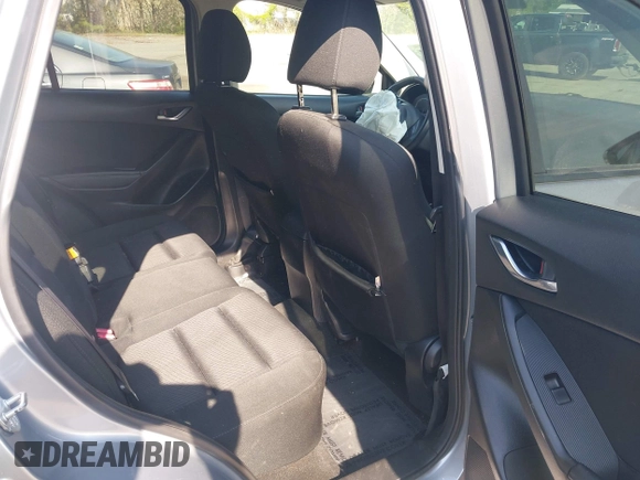 2014 Mazda CX-5 Touring with VIN JM3KE2CY9E0310315, listed as a IAAI auction lot 41943991 with 98,359 mi miles and . Bid and sale history available at carsss.com. Image 8.