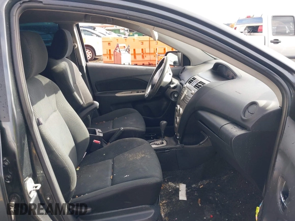 2010 Toyota Yaris with VIN JTDBT4K37A4068398, listed as a IAAI auction lot 40915313 with 123,222 mi miles. Bid and sale history available at carsss.com. Image 5.