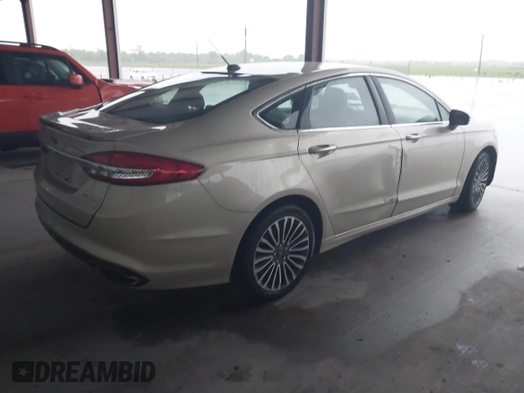 2017 Ford Fusion Titanium with VIN 3FA6P0K96HR346749, listed as a IAAI auction lot 42464431 with 134,933 mi miles and . Bid and sale history available at DreamBid. Image 4.