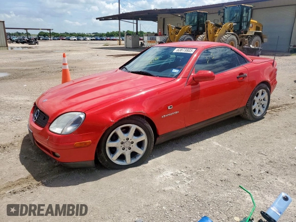2000 Mercedes-Benz SLK 230 Kompressor with VIN WDBKK47F2YF156715, listed as a Copart auction lot 63873805 with 140,706 mi miles and Salvage title. Bid and sale history available at DreamBid. Image 1.