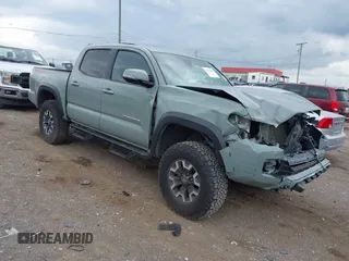 2022 Toyota Tacoma SR z VIN 3TMCZ5AN2NM461831, wystawiony jako IAAI lot #42155340 z przebiegiem 51 482 mil mil oraz . Historia ofert i sprzedaży dostępna na DreamBid. Obrazek 1.