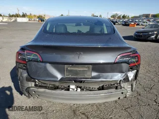 2023 Tesla Model 3 with VIN 5YJ3E1EA4PF556782, listed as a Copart auction lot 55626935 with 26,615 mi miles and Salvage title. Bid and sale history available at DreamBid. Image 6.