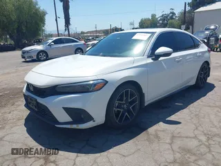 2022 Honda Civic Sport Touring z VIN 19XFL1G82NE000678, wystawiony jako IAAI lot #42221847 z przebiegiem 90 869 mil mil oraz . Historia ofert i sprzedaży dostępna na DreamBid. Obrazek 17.