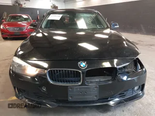 2014 BMW 3 Series 328i xDrive with VIN WBA3B3G50ENR83599, listed as a IAAI auction lot 42106340 with 195,309 mi miles. Bid and sale history available at carsss.com. Image 12.