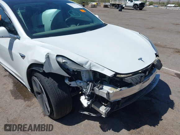 2018 Tesla Model 3 Long Range Battery with VIN 5YJ3E1EA3JF057527, listed as a IAAI auction lot 42072126 with 1 mi miles. Bid and sale history available at carsss.com. Image 18.