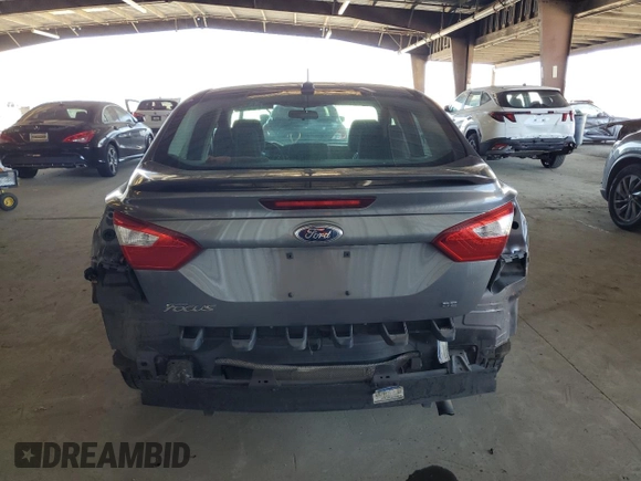 2012 Ford Focus SE with VIN 1FAHP3F28CL114572, listed as a Copart auction lot 63053035 with 142,994 mi miles and Salvage title. Bid and sale history available at DreamBid. Image 6.