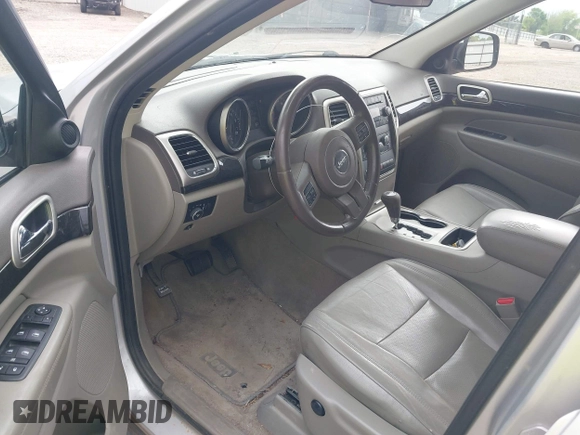 2011 Jeep Grand Cherokee Laredo with VIN 1J4RS4GGXBC564035, listed as a IAAI auction lot 41931861 with 242,291 mi miles and . Bid and sale history available at DreamBid. Image 15.