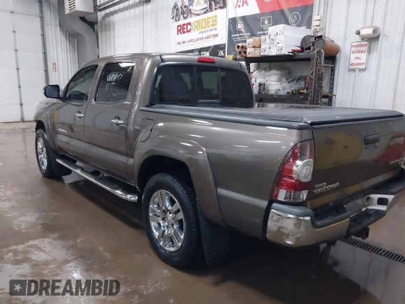 2014 Toyota Tacoma PreRunner with VIN 3TMJU4GNXEM164507, listed as a IAAI auction lot 42118984 with 183,101 mi miles and . Bid and sale history available at DreamBid. Image 3.