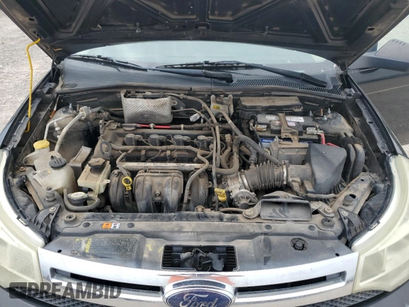 2009 Ford Focus SE z VIN 1FAHP35N29W248755, wystawiony jako Copart lot #55653955 z przebiegiem 213 234 mil mil oraz Szkoda całkowita • Salvage title. Historia ofert i sprzedaży dostępna na DreamBid. Obrazek 11.