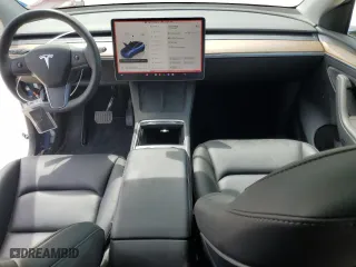 2023 Tesla Model Y Long Range with VIN 7SAYGDEE3PF832070, listed as a Copart auction lot 50065335 with 13,469 mi miles and Salvage Title. Bid and sale history available at carsss.com. Image 8.