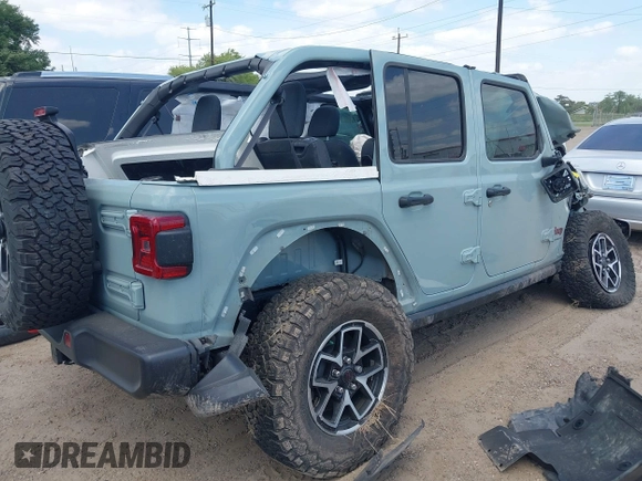 2024 Jeep Wrangler Rubicon with VIN 1C4PJXFG4RW266186, listed as a IAAI auction lot 42043265 with Not provided miles and . Bid and sale history available at DreamBid. Image 4.