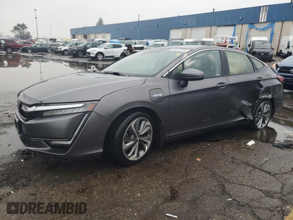 2018 Honda Clarity Plug-In Hybrid with VIN JHMZC5F17JC022801, listed as a Copart auction lot 84013154 with 106,590 mi miles and Clean Title. Bid and sale history available at carsss.com. Image 1.