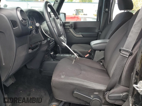 2013 Jeep Wrangler Unlimited Sport z VIN 1C4HJWDG2DL698061, wystawiony jako Copart lot #57823945 z przebiegiem 144 558 mil mil oraz Czysty tytuł • Clean title. Historia ofert i sprzedaży dostępna na DreamBid. Obrazek 7.