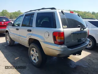2004 Jeep Grand Cherokee Laredo with VIN 1J4GW48S74C260968, listed as a IAAI auction lot 42050628 with 192,602 mi miles. Bid and sale history available at carsss.com. Image 3.