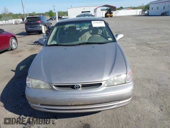 1998 Toyota Corolla VE z VIN 2T1BR18E9WC045442, wystawiony jako IAAI lot #42104201 z przebiegiem 243 256 mil mil oraz . Historia ofert i sprzedaży dostępna na DreamBid. Obrazek 12.