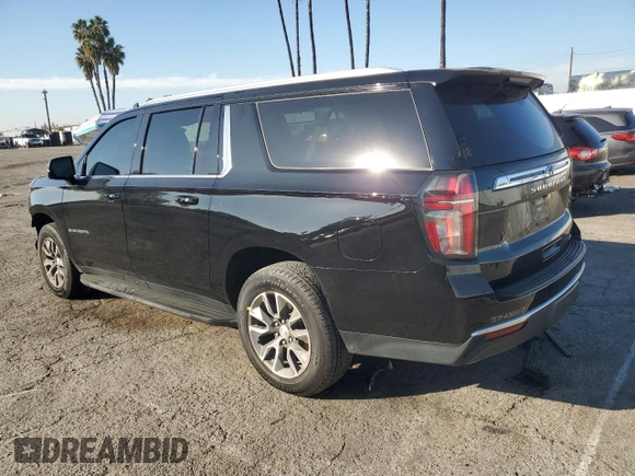 2023 Chevrolet Suburban LT with VIN 1GNSCCKD1PR124986, listed as a Copart auction lot 87432904 with 105,026 mi miles and Salvage Title. Bid and sale history available at DreamBid. Image 2.