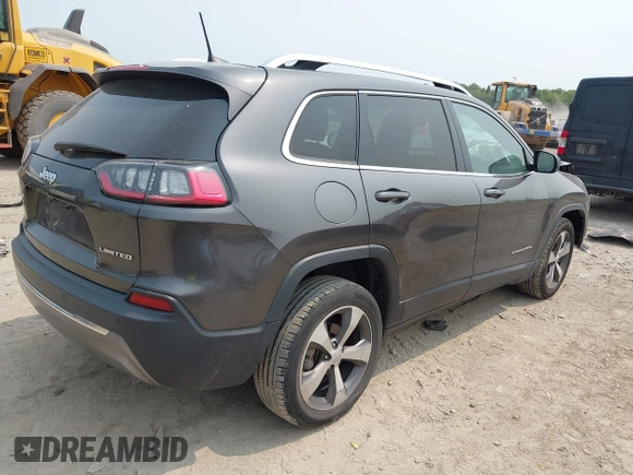 2020 Jeep Cherokee Limited z VIN 1C4PJLDB3LD614479, wystawiony jako IAAI lot #42363037 z przebiegiem 100 767 mil mil oraz . Historia ofert i sprzedaży dostępna na DreamBid. Obrazek 4.