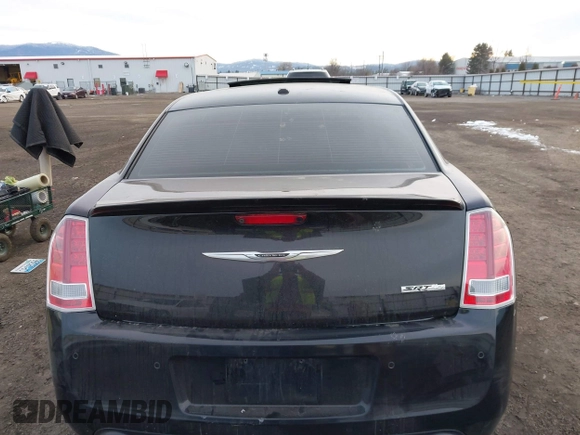 2013 Chrysler 300 SRT-8 with VIN 2C3CCAFJ8DH669813, listed as a IAAI auction lot 41360545 with 46,061 mi miles and . Bid and sale history available at DreamBid. Image 16.
