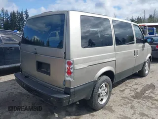 2003 Chevrolet Astro with VIN 1GNEL19X33B118742, listed as a IAAI auction lot 41994081 with 219,333 mi miles. Bid and sale history available at carsss.com. Image 4.