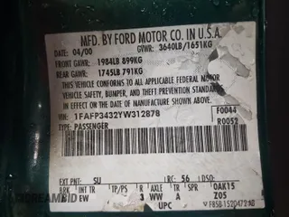 2000 Ford Focus SE with VIN 1FAFP3432YW312878, listed as a Copart auction lot 45812005 with 164,560 mi miles and Salvage Title. Bid and sale history available at carsss.com. Image 12.