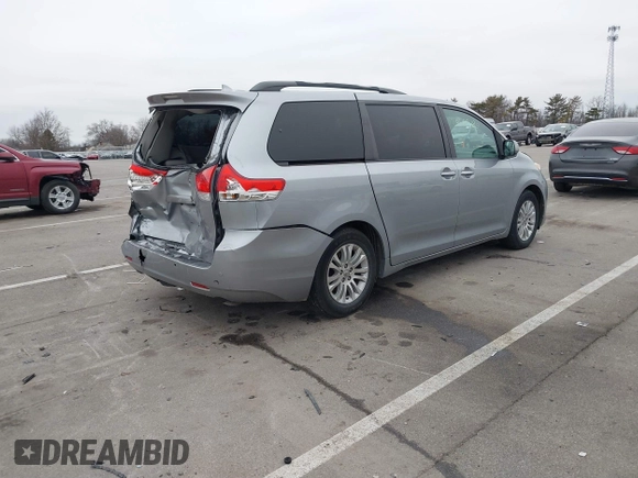 2011 Toyota Sienna XLE AAS with VIN 5TDYK3DC5BS150527, listed as a IAAI auction lot 41143189 with 147,551 mi miles and . Bid and sale history available at DreamBid. Image 4.
