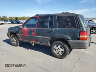 1995 Jeep Grand Cherokee Laredo with VIN 1J4FX58S5SC741328, listed as a Copart auction lot 82034594 with 260,398 mi miles and Clean Title. Bid and sale history available at carsss.com. Image 2.