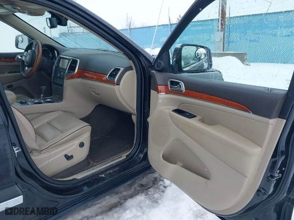 2011 Jeep Grand Cherokee Overland with VIN 1J4RR6GT5BC604784, listed as a IAAI auction lot 41515626 with 66,654 mi miles. Bid and sale history available at carsss.com. Image 5.