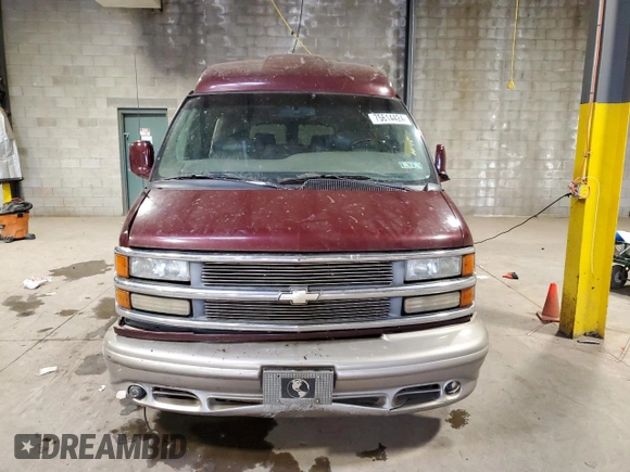 2002 Chevrolet Express z VIN 1GBFG15R921215686, wystawiony jako Copart lot #75614424 z przebiegiem Nie podano mil oraz Szkody całkowita. Historia ofert i sprzedaży dostępna na DreamBid. Obrazek 5.