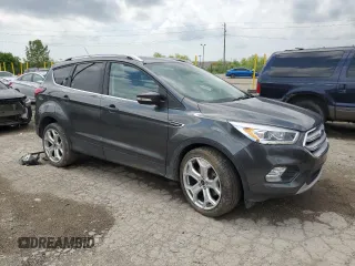 2019 Ford Escape Titanium with VIN 1FMCU0J93KUA81968, listed as a Copart auction lot 56232665 with 26,631 mi miles and Salvage title. Bid and sale history available at DreamBid. Image 4.