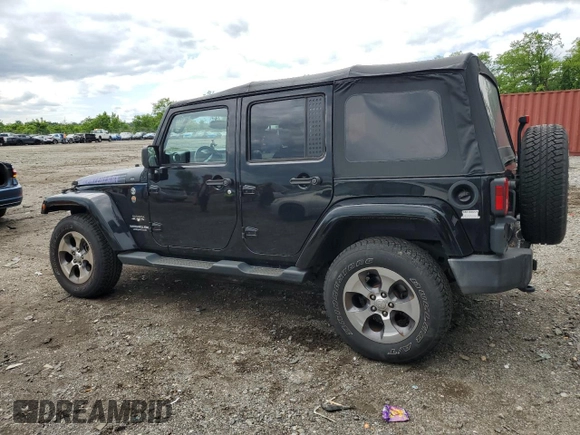 2016 Jeep Wrangler Unlimited Sahara with VIN 1C4BJWEG8GL150249, listed as a Copart auction lot 57574525 with 104,206 mi miles and Salvage title. Bid and sale history available at DreamBid. Image 2.