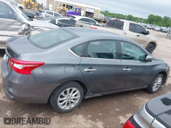 2019 Nissan Sentra S with VIN 3N1AB7AP9KY415350, listed as a IAAI auction lot 41059859 with 51,416 mi miles and . Bid and sale history available at DreamBid. Image 13.