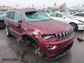 2021 Jeep Grand Cherokee Laredo X with VIN 1C4RJEAG4MC681989, listed as a IAAI auction lot 41571341 with 61,090 mi miles. Bid and sale history available at carsss.com. Image 6.
