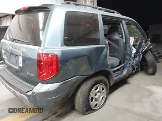 2005 Honda Pilot LX z VIN 2HKYF18135H537704, wystawiony jako IAAI lot #41091540 z przebiegiem Nie podano mil oraz . Historia ofert i sprzedaży dostępna na DreamBid. Obrazek 4.