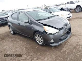 2012 Toyota Prius c One with VIN JTDKDTB35C1015243, listed as a IAAI auction lot 41692077 with 304,394 mi miles. Bid and sale history available at carsss.com. Image 1.