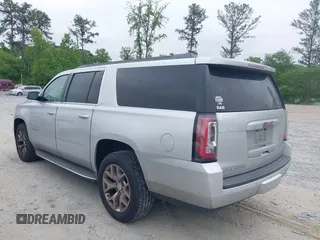 2015 GMC Yukon XL SLT with VIN 1GKS1HKC2FR251672, listed as a IAAI auction lot 42152312 with 232,736 mi miles and . Bid and sale history available at carsss.com. Image 14.