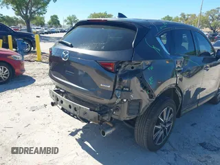 2018 Mazda CX-5 Grand Touring with VIN JM3KFBDM8J0314925, listed as a IAAI auction lot 41825917 with 70,027 mi miles. Bid and sale history available at carsss.com. Image 6.