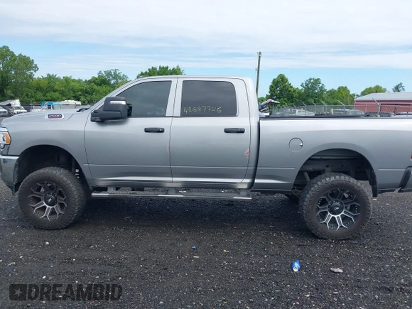 2023 Ram 2500 Tradesman with VIN 3C6UR5CJXPG590942, listed as a IAAI auction lot 42587742 with 76,595 mi miles and . Bid and sale history available at DreamBid. Image 14.