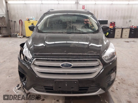 2018 Ford Escape SE z VIN 1FMCU9GD0JUC25636, wystawiony jako IAAI lot #40996760 z przebiegiem 70 097 mil mil oraz . Historia ofert i sprzedaży dostępna na DreamBid. Obrazek 13.