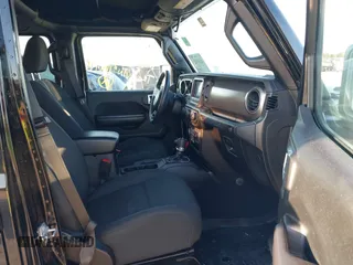 2018 Jeep Wrangler Unlimited Sport S z VIN 1C4HJXDG9JW169478, wystawiony jako IAAI lot #40387425 z przebiegiem 59 287 mil mil oraz . Historia ofert i sprzedaży dostępna na DreamBid. Obrazek 5.