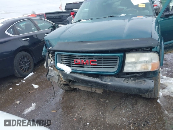1998 GMC Jimmy SL with VIN 1GKCS13W4W2562613, listed as a IAAI auction lot 41610601 with 1 mi miles. Bid and sale history available at carsss.com. Image 6.