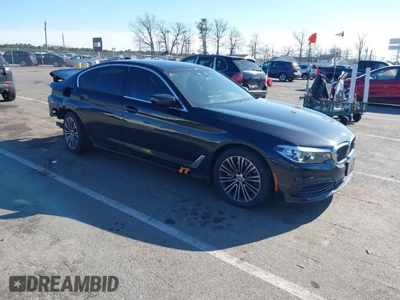 2019 BMW 5 Series 530i xDrive with VIN WBAJA7C50KG910787, listed as a IAAI auction lot 41761104 with 65,018 mi miles. Bid and sale history available at carsss.com. Image 1.