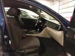 2016 Kia Optima LX with VIN 5XXGT4L34GG002569, listed as a IAAI auction lot 41732810 with 148,044 mi miles. Bid and sale history available at carsss.com. Image 5.