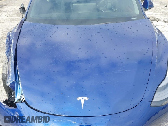 2023 Tesla Model 3 with VIN 5YJ3E1EA0PF518983, listed as a IAAI auction lot 41749225 with 26,748 mi miles and . Bid and sale history available at DreamBid. Image 10.