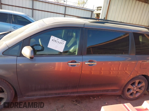 2014 Toyota Sienna SE with VIN 5TDXK3DC1ES462473, listed as a IAAI auction lot 41811437 with 209,704 mi miles and . Bid and sale history available at DreamBid. Image 14.