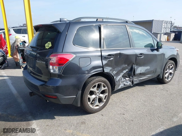 2018 Subaru Forester Touring with VIN JF2SJAWC7JH441559, listed as a IAAI auction lot 41599025 with 105,828 mi miles. Bid and sale history available at carsss.com. Image 4.