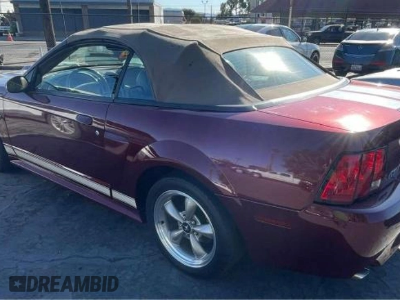 2004 Ford Mustang GT Deluxe z VIN 1FAFP45XX4F150757, wystawiony jako Copart lot #51550375 z przebiegiem 43 827 mil mil oraz Tytuł czysty. Historia ofert i sprzedaży dostępna na DreamBid. Obrazek 3.