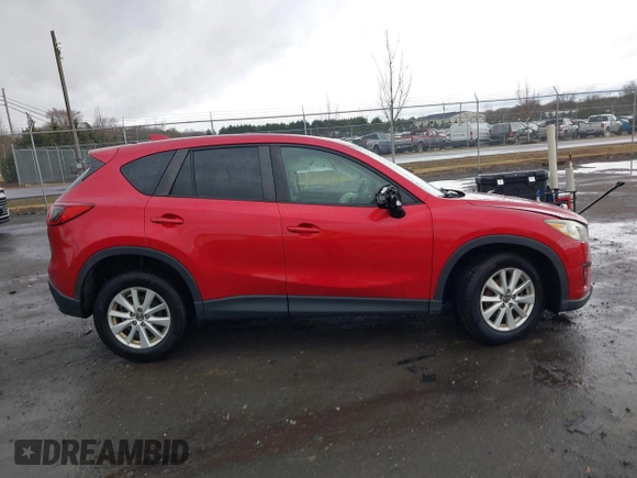 2014 Mazda CX-5 Touring with VIN JM3KE2CY2E0322211, listed as a IAAI auction lot 41721219 with 127,312 mi miles. Bid and sale history available at carsss.com. Image 13.