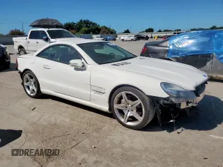 2009 Mercedes-Benz SL 550 with VIN WDBSK71F69F147589, listed as a Copart auction lot 65976995 with 77,387 mi miles and Salvage title. Bid and sale history available at DreamBid. Image 4.