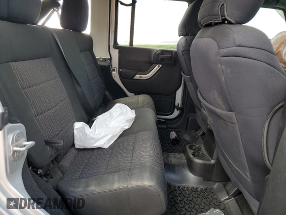 2012 Jeep Wrangler Unlimited Altitude with VIN 1C4HJWEG8CL163653, listed as a Copart auction lot 55279045 with 107,076 mi miles and Salvage title. Bid and sale history available at DreamBid. Image 11.